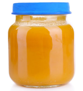 small glass jar of baby food with a blue lid