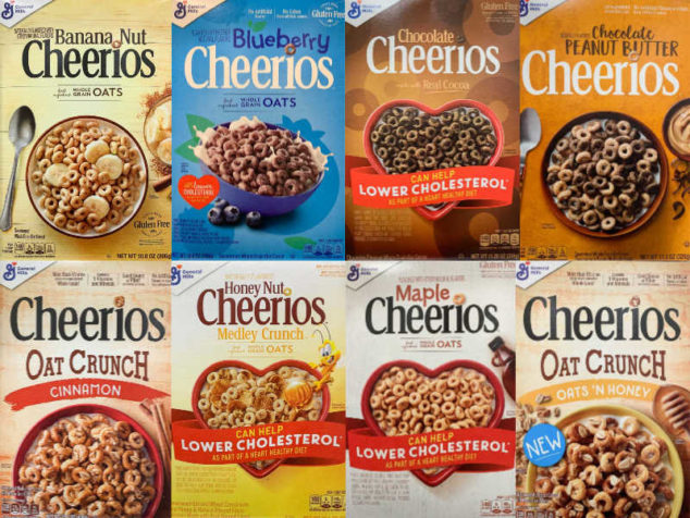 collage of various flavored Cheerios cereal boxes