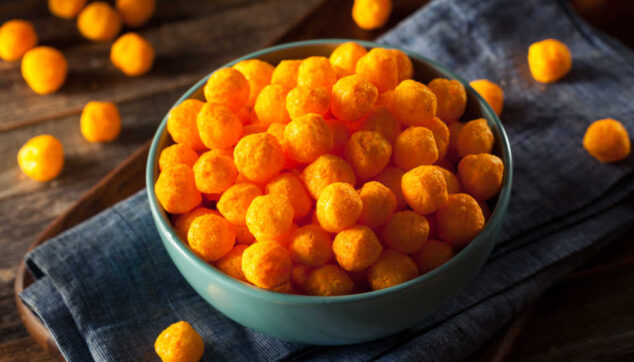 a bowl of puffed cheese balls