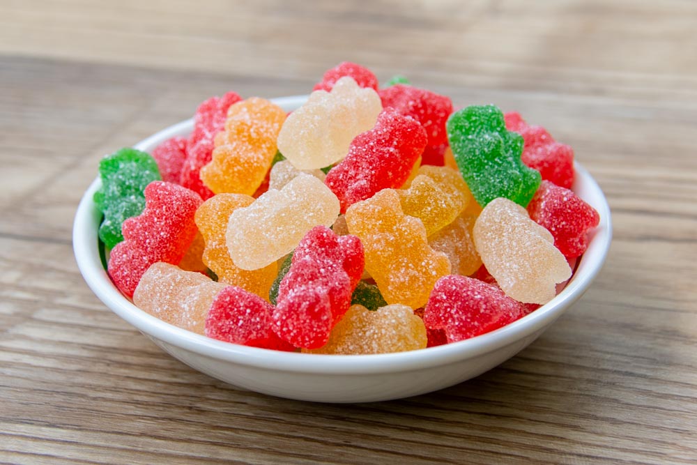 a bowl of sour gummy bears