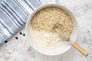quick cooking oats and flour in a bowl