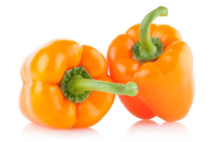 two orange bell peppers