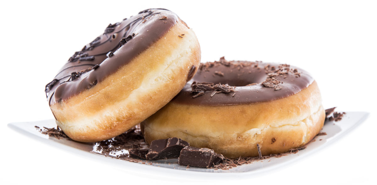 two chocolate donuts on a plate.