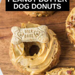 iced peanut butter dog donuts on a wood board.