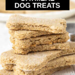 a stack of homemade peanut butter oatmeal dog treats.