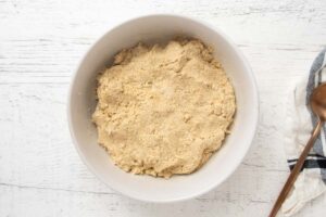 peanut butter oatmeal dog treats dough in a bowl.