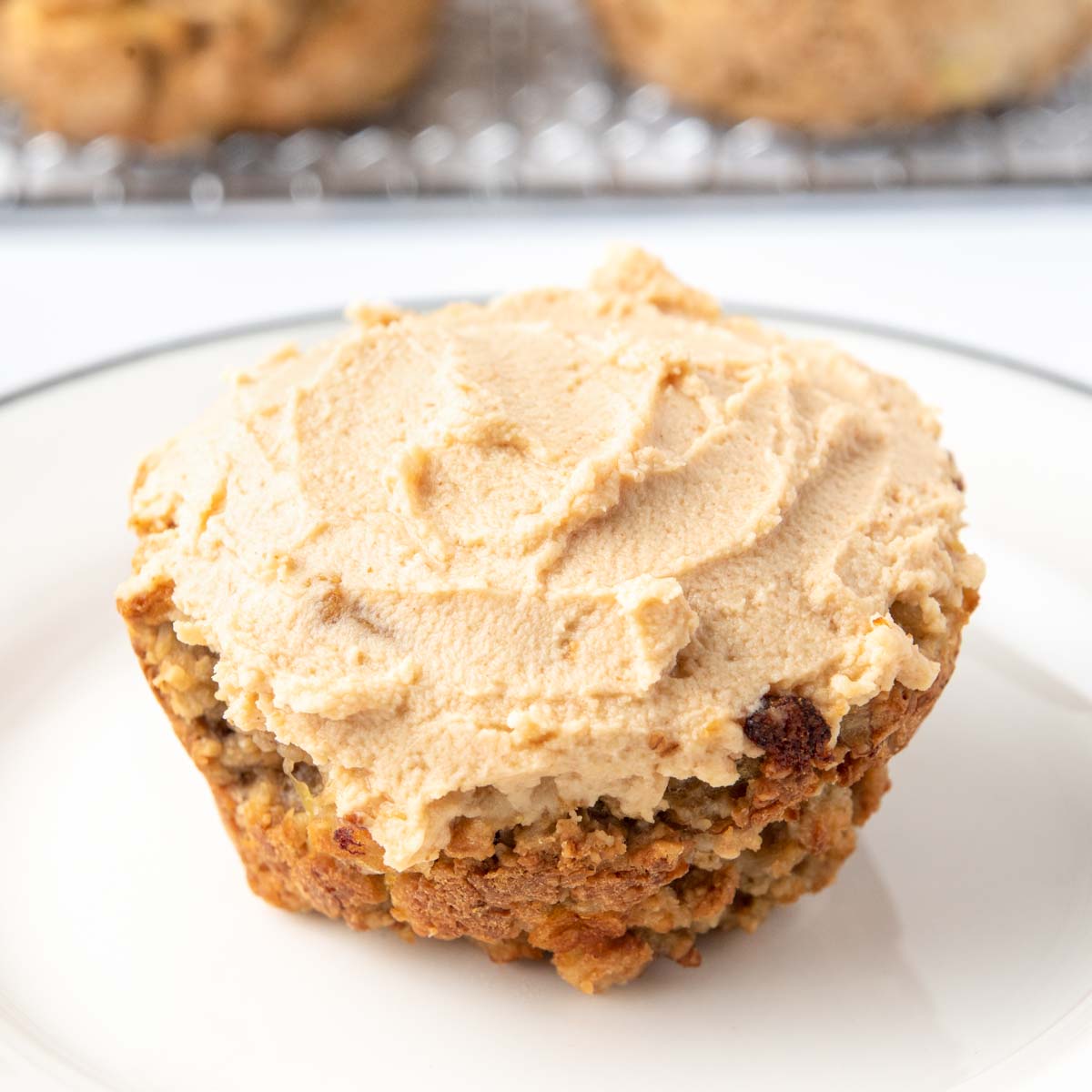 Apple pupcake with peanut butter yogurt frosting.