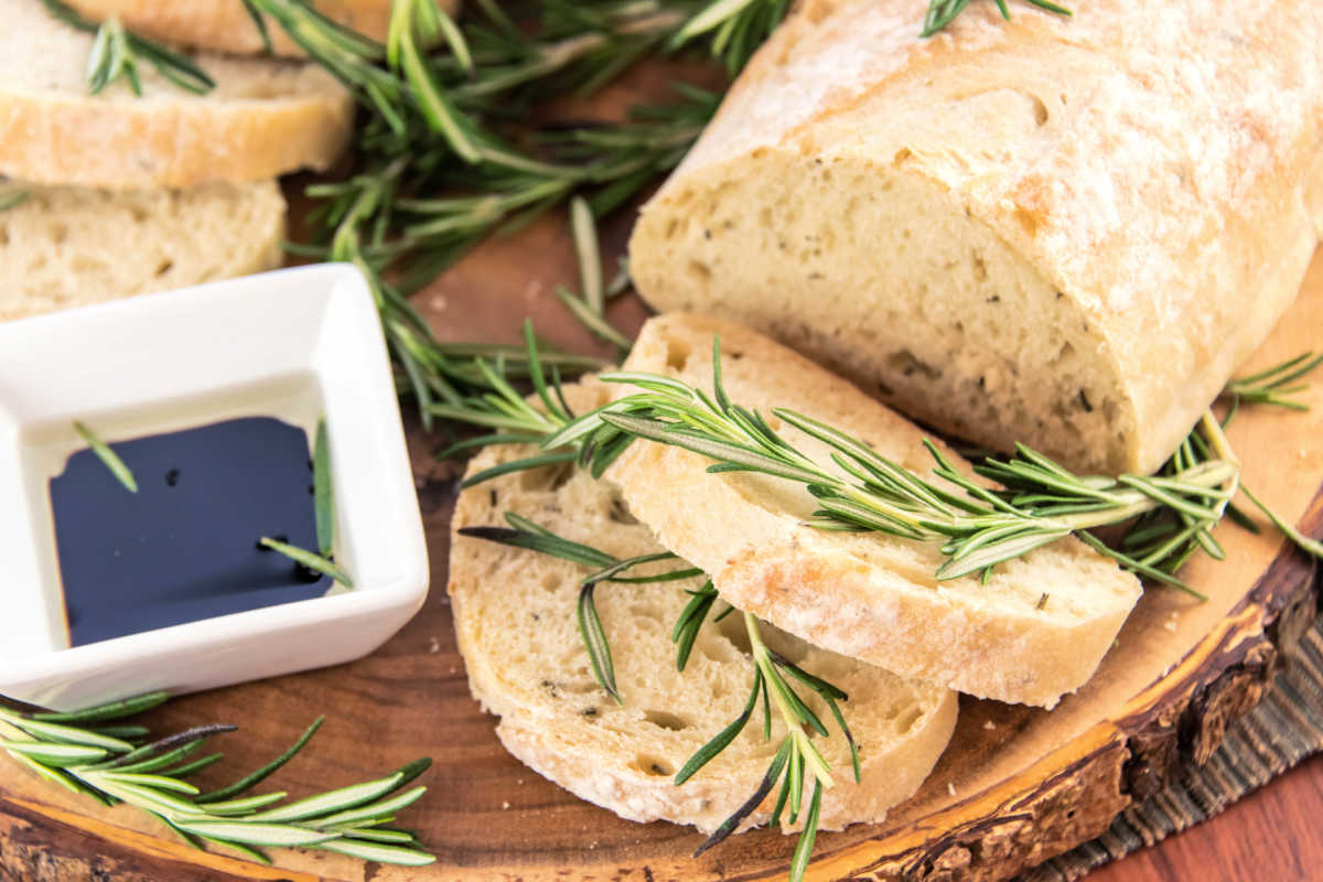 rosemary bread and fresh rosemary on a platter.