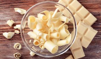 white chocolate bar and curls in a bowl.