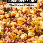 corned beef hash in a stainless steel skillet.
