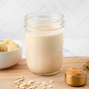 Peanut butter smoothie for dogs in a jar.