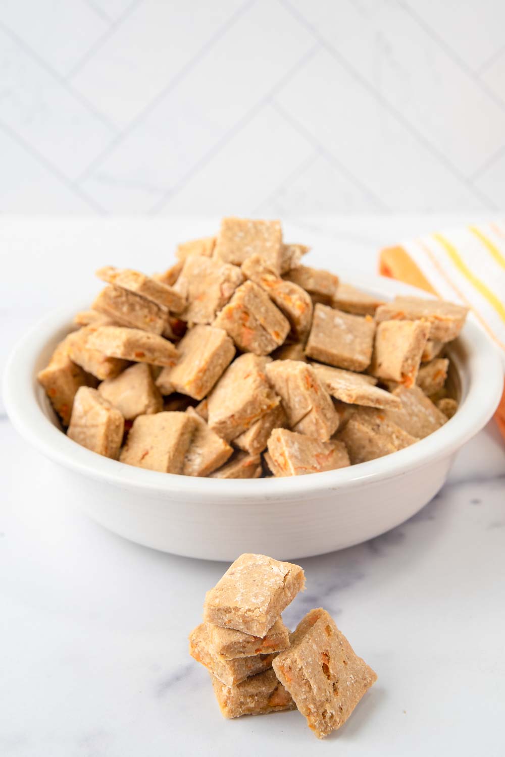 Homemade low calorie dog treats in a small bowl.