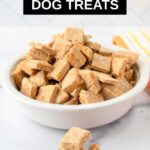 Homemade low calorie dog treats in a stack and in a white bowl.
