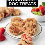 Homemade strawberry dog treats on a plate and strawberries in a bowl.