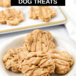 Apple peanut butter dog treats on a plate and marble board.