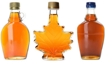 Assorted bottles of maple syrup.