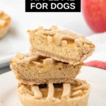 Homemade apple pies for dogs stacked on a plate.