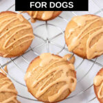 Overhead view of peanut butter dog cupcakes on a wire rack.