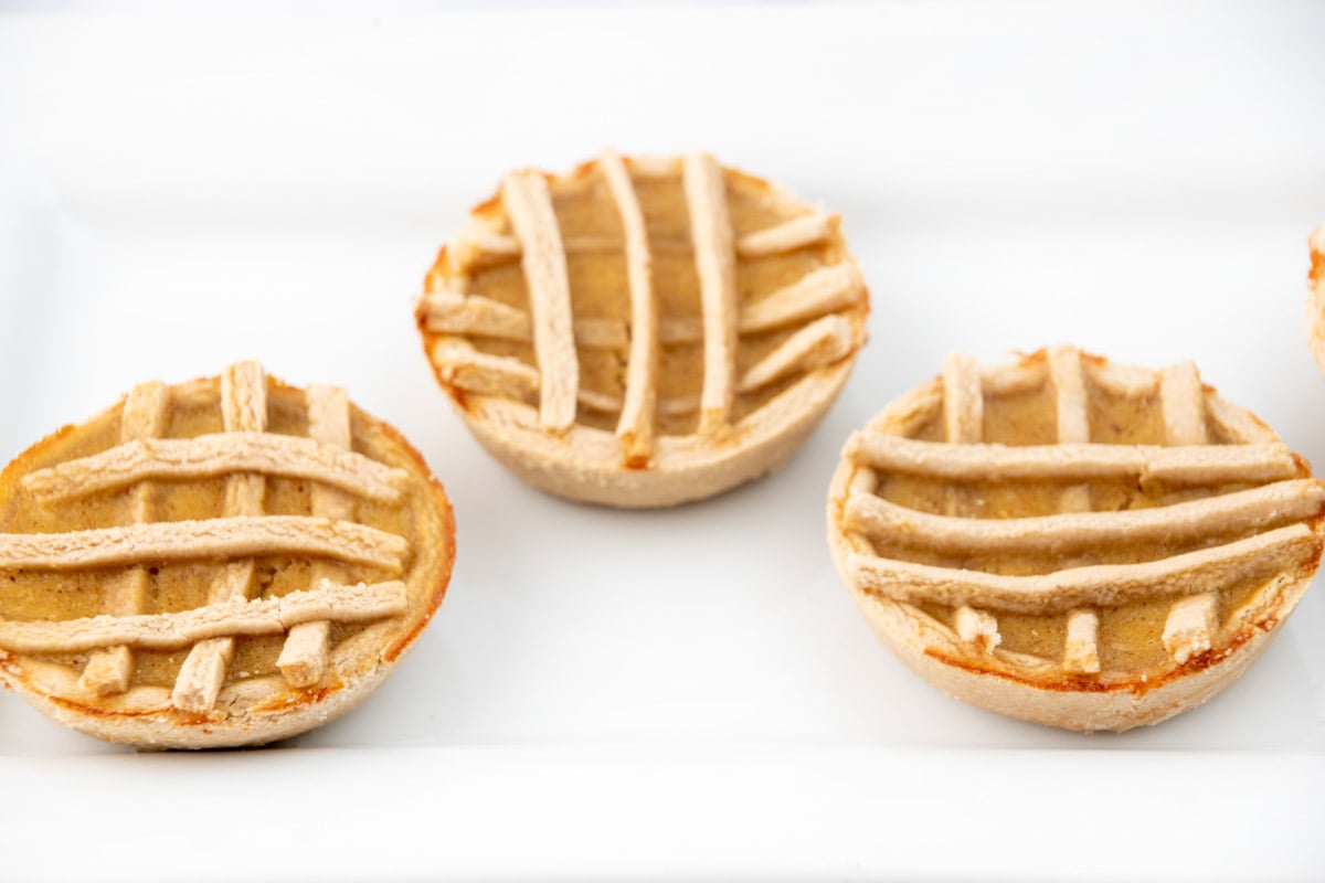 Three mini apple pies made for dogs.