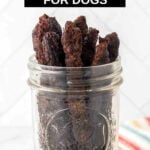 Homemade venison jerky for dogs in a mason jar.