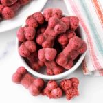 Homemade beet dog treats in a bowl.