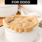 A homemade chicken pot pie for dogs on a plate.