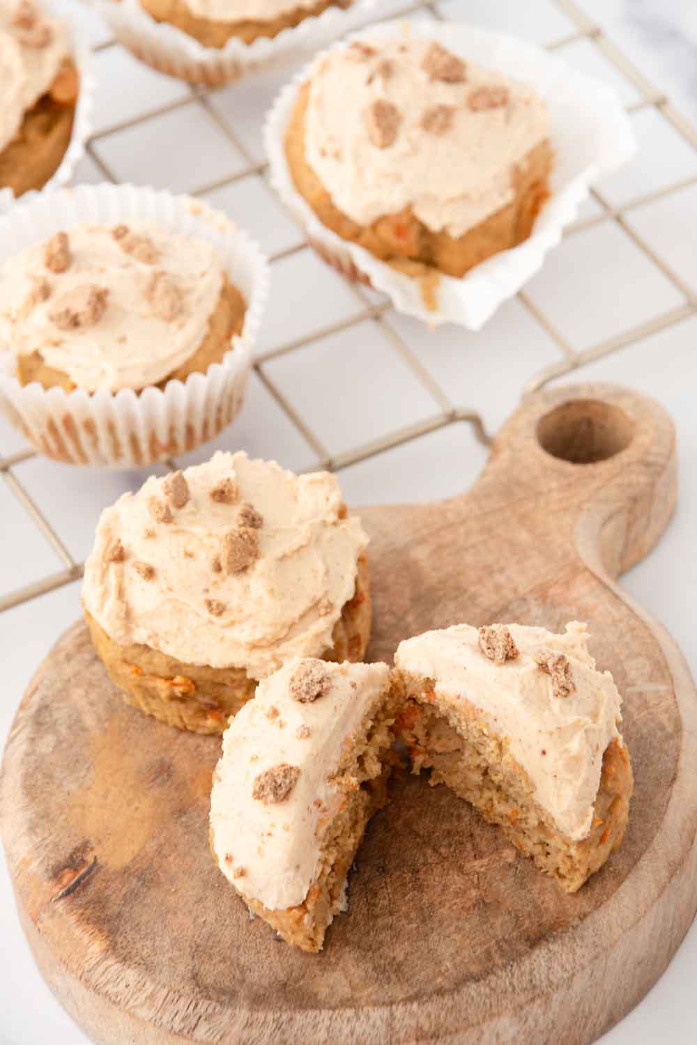 Homemade carrot cupcakes for dogs with peanut butter frosting.