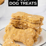 Homemade duck and sweet potato dog treats stacked on a plate.