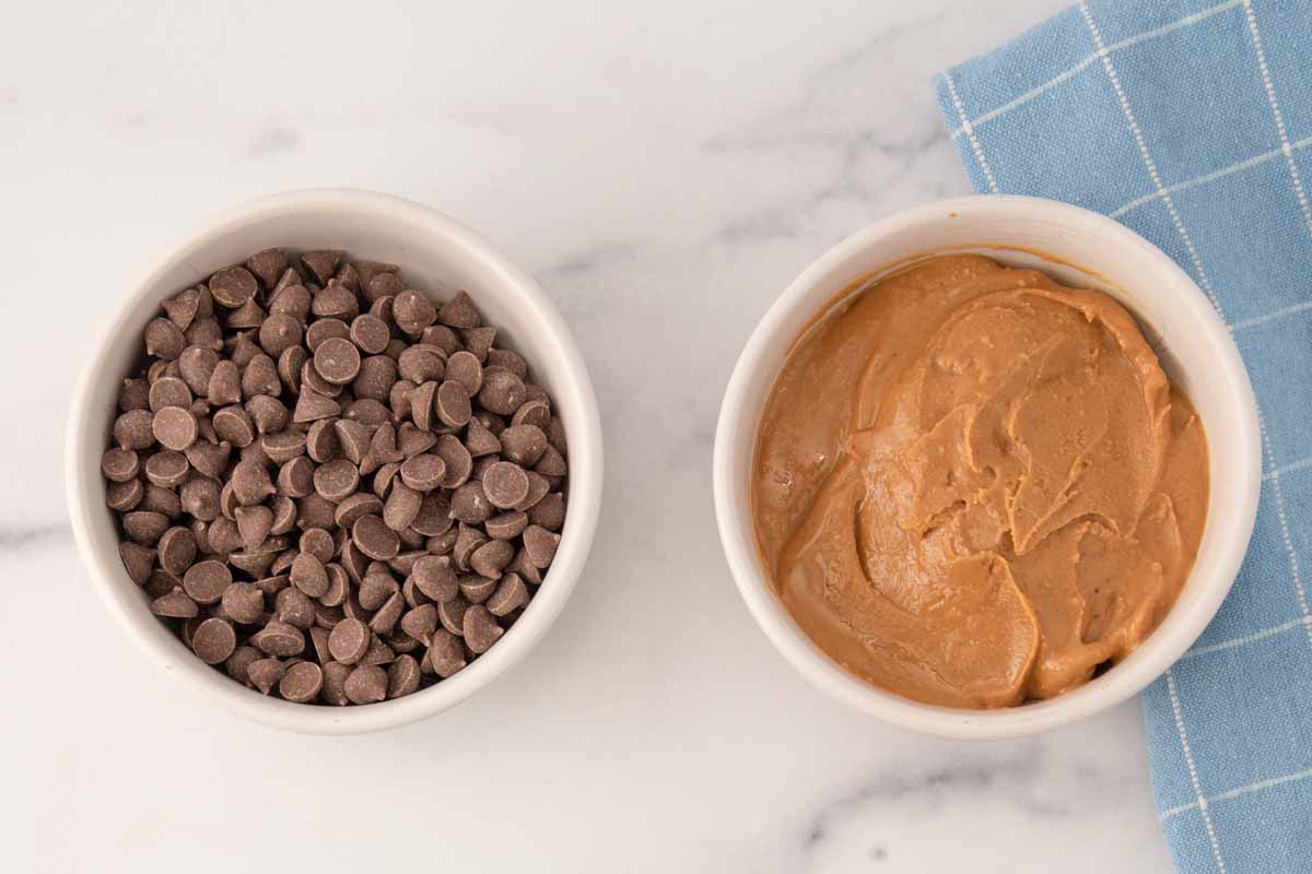 Carob peanut butter Easter dog treats ingredients in bowls.