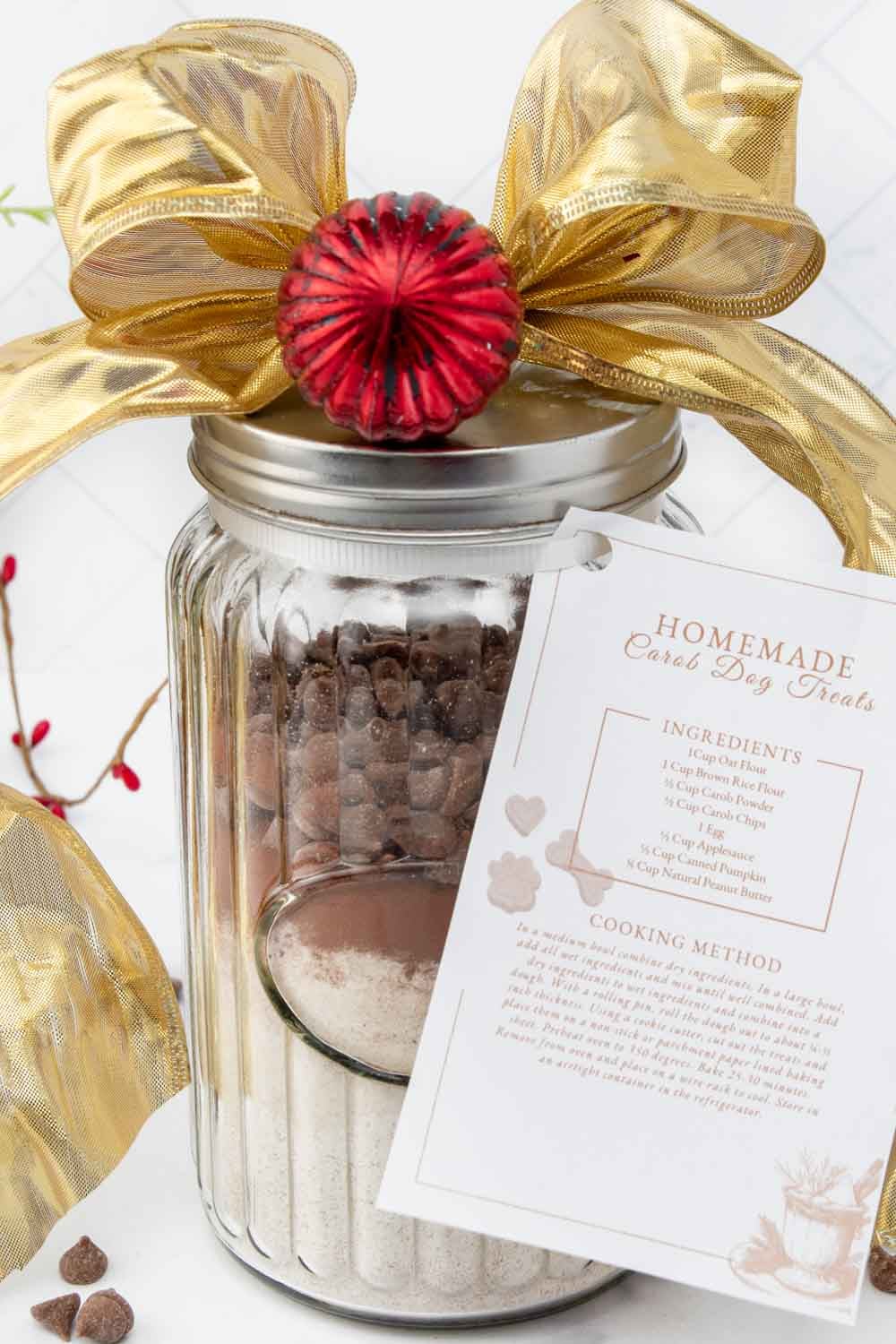 Decorated dog treat mix in a jar with recipe card.