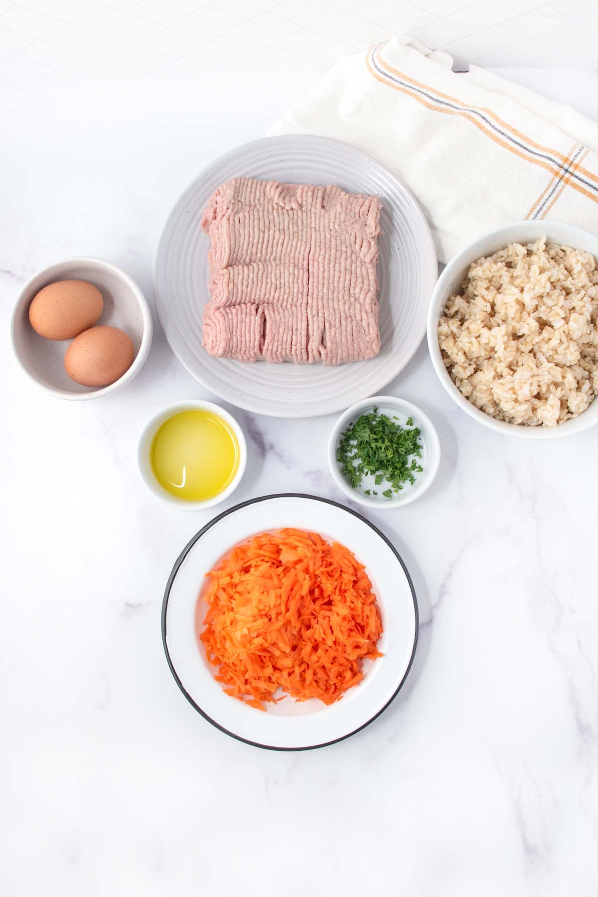 Homemade dog food with eggs ingredients in bowls.