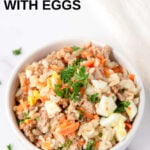 A bowl of homemade dog food with eggs.