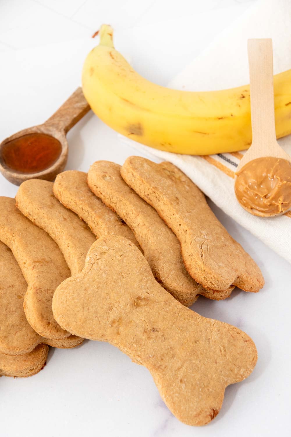 Homemade bone-shaped honey dog treats.
