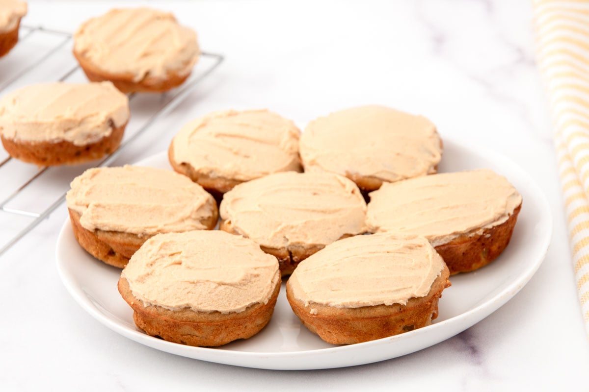Homemade peanut butter banana pupcakes with peanut butter yogurt frosting.