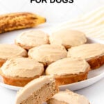 Peanut butter banana cupcakes for dogs on a plate and a banana behind it.