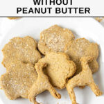 Homemade dog treats without peanut butter piled on a plate.