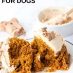 Homemade microwave mug cake for dogs cut in half on a plate.