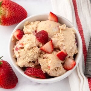 Berry cottage cheese ice cream for dogs in a bowl.