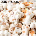 A pile of homemade frozen peanut butter banana dog treats.