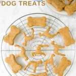 Homemade peanut butter banana dog treats on a round wire rack.