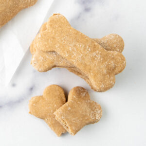 Homemade 2 ingredient dog treats in a stack.