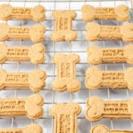 Homemade beef broth dog treats on a wire rack.