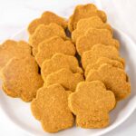 Homemade sardine dog treats on a plate.
