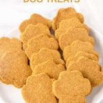 A plate of paw-shaped homemade sardine dog treats.