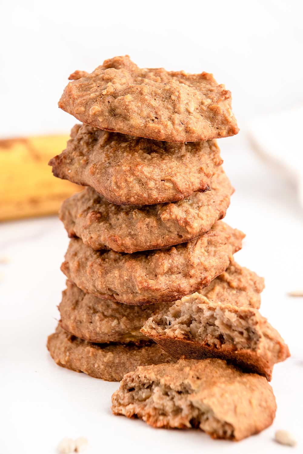 Homemade sunflower seed dog treats in a stack.