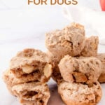 Homemade apple muffins for dogs in stacks.