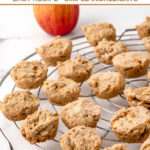 Homemade mini apple muffins for dogs on a round wire rack.