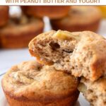 Tow banana muffins for dogs on a plate and one split in half.