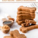 Homemade molasses dog treats in a stack and a few in front of it.