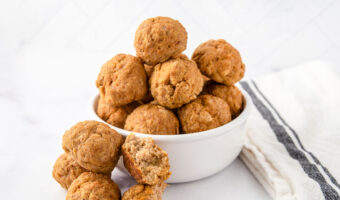 A bowl of homemade turkey pumpkin meatballs for dogs.